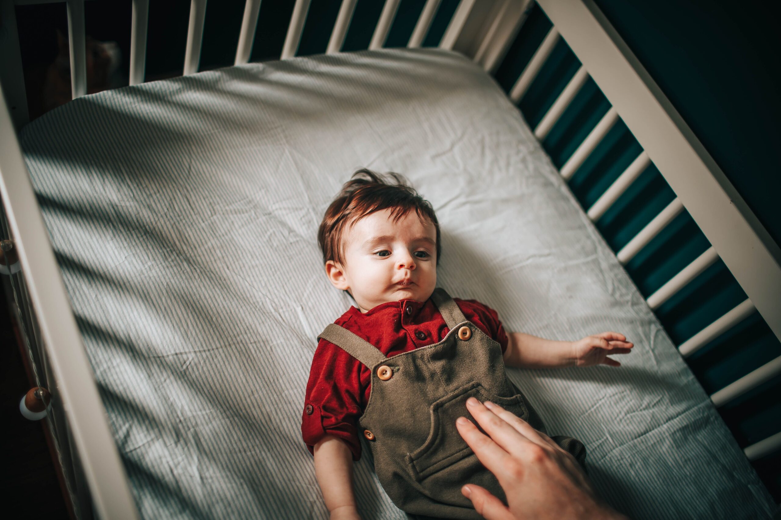 Baby waking up in crib after a short sleep stretch