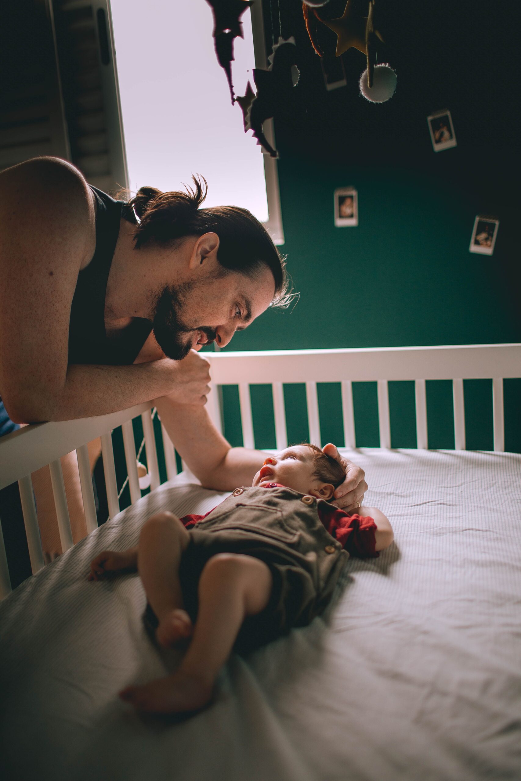Parent comforting a baby during bedtime