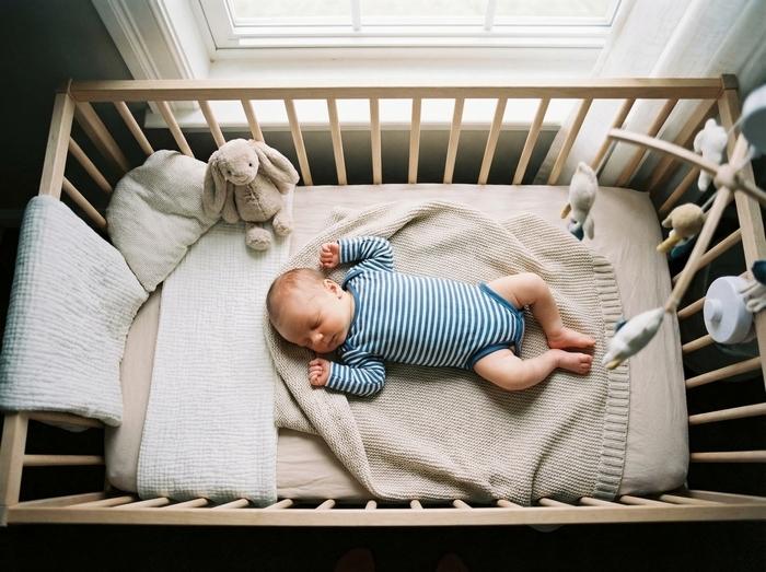 Baby sleeping peacefully in nursery